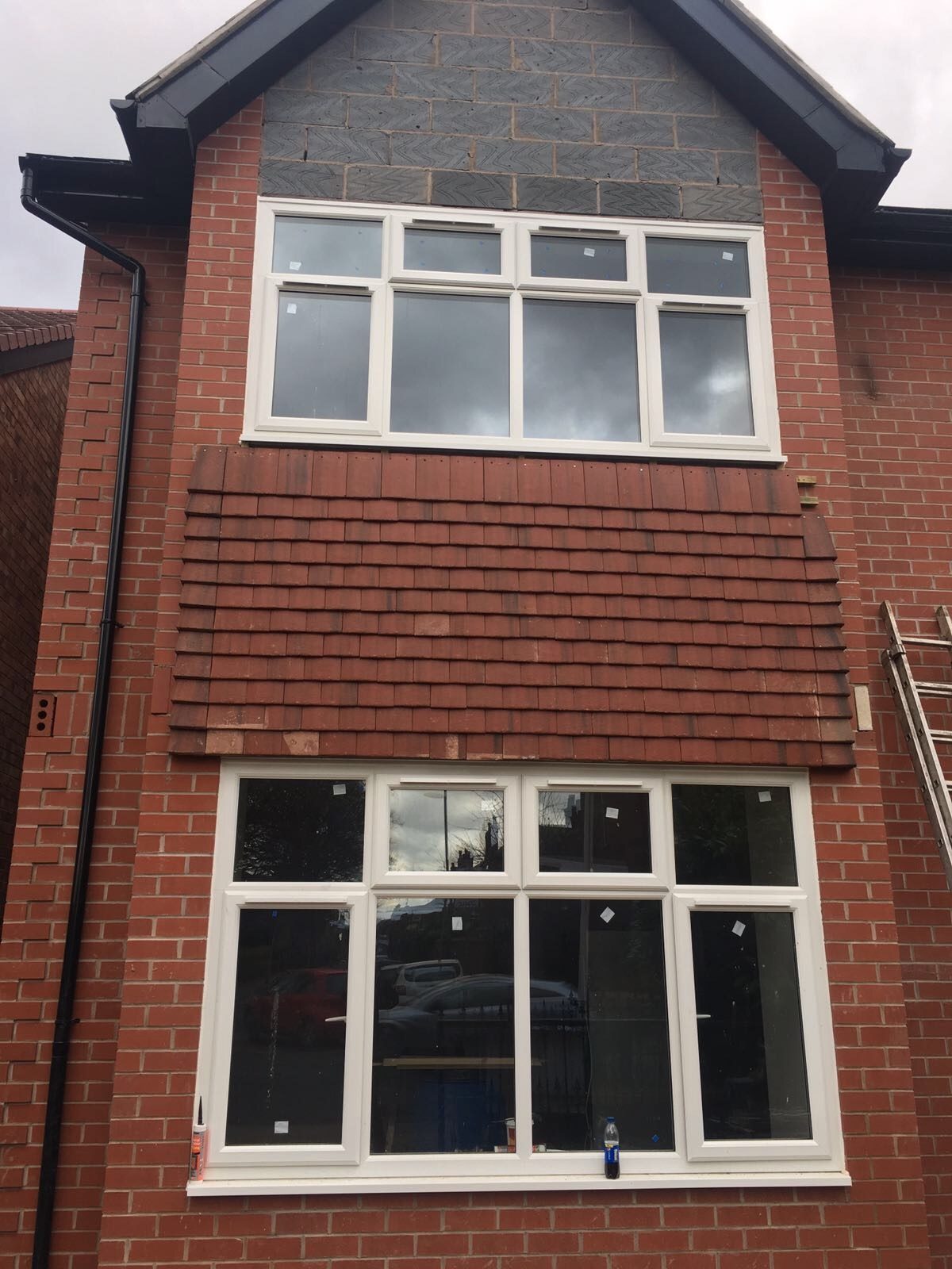 External house renovation with new render and windows